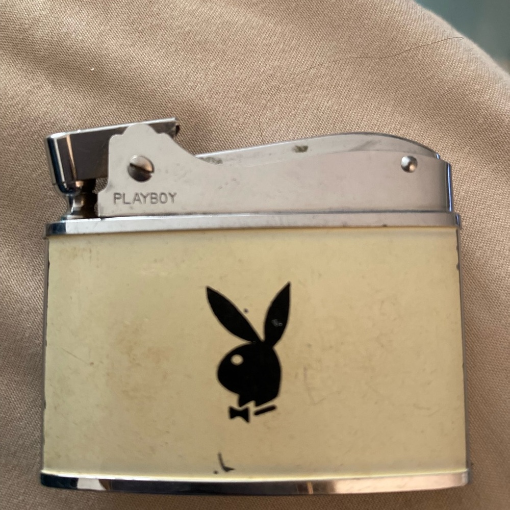 Highly collectible rare Playboy Cream and Silver Lighter